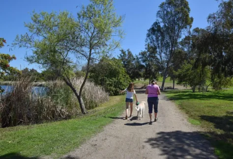 Walking the dog at Guajome Park.